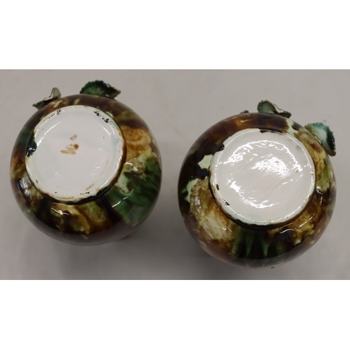 3013 - A pair of Majolica vases, 20cm high. (1 rose petal damaged, 3 leaves damaged and 1 chip to 1 leaf).