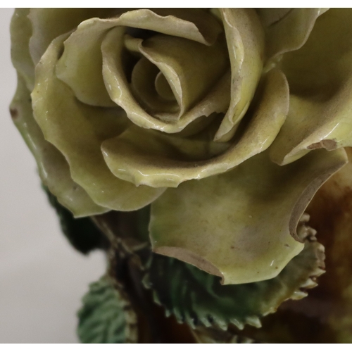 3013 - A pair of Majolica vases, 20cm high. (1 rose petal damaged, 3 leaves damaged and 1 chip to 1 leaf).