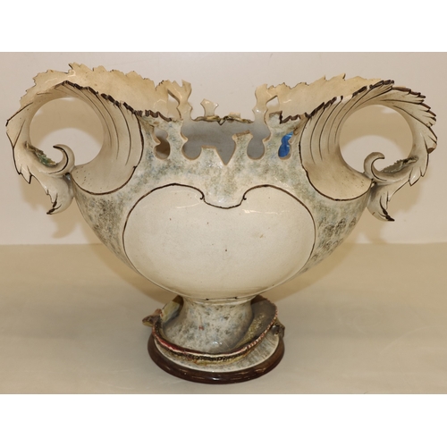 3015 - A large 2-handled Majolica jardiniere (damage all around and some loose parts), 35cm high, a set of ... 