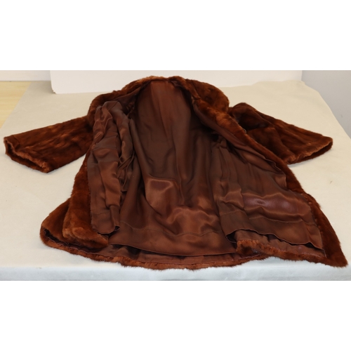 3016 - A chestnut brown fur coat, approx. size 12, 100cm long, shoulder to sleeve, 64cm long.