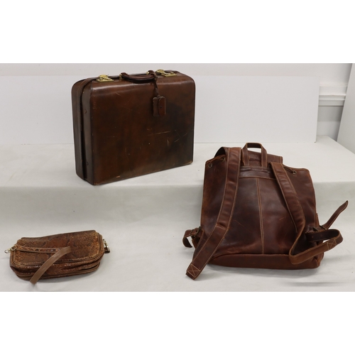 3026 - A small brown leather travel case, 45cm wide, 15cm high, 37cm high, with lock and 2 keys (in good co... 