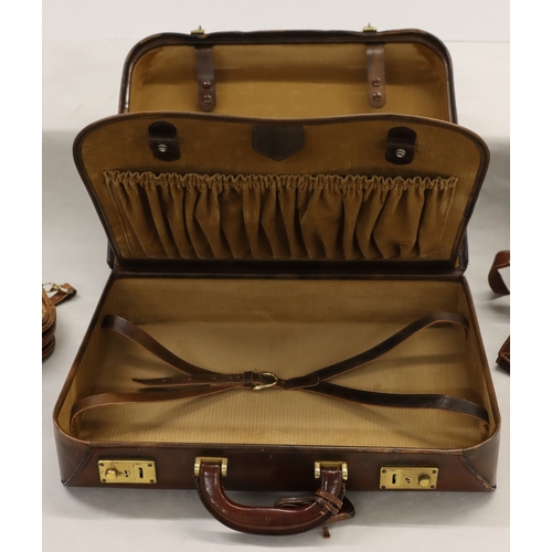 3026 - A small brown leather travel case, 45cm wide, 15cm high, 37cm high, with lock and 2 keys (in good co... 