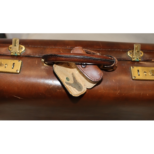 3026 - A small brown leather travel case, 45cm wide, 15cm high, 37cm high, with lock and 2 keys (in good co... 