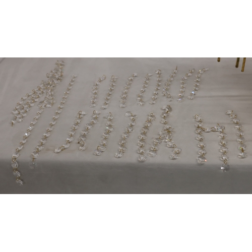 3031 - A modern gold-coloured 4-light pendant light with a quantity of crystal droplets, 48cm long excludin... 