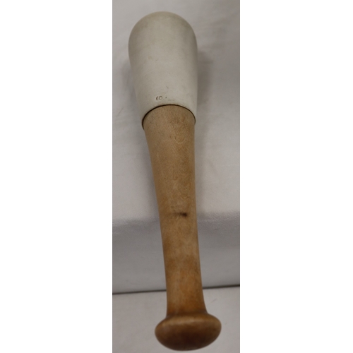 3032 - A large stone pestle and mortar, 29cm diameter, 15.5cm high, pestle, 31cm long.
