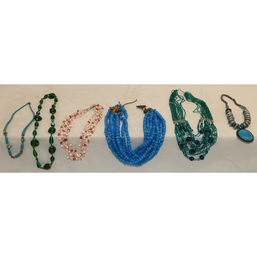 3036 - A quantity of various costume jewellery necklaces.