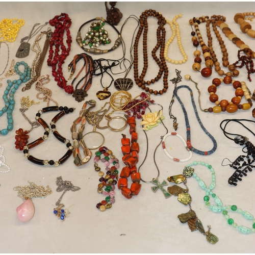 3038 - A large quantity of costume jewellery necklaces and some bangles etc.