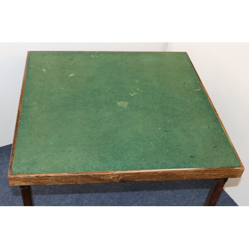3039 - A folding Bridge table, 76cm x 76cm, 67.5cm high. (Marks and wear to felt top).