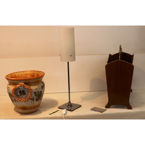 3040 - A vintage magazine rack, 41.5cm wide, 18cm deep, 40cm high, an Italian earthenware pot, 25cm diamete... 