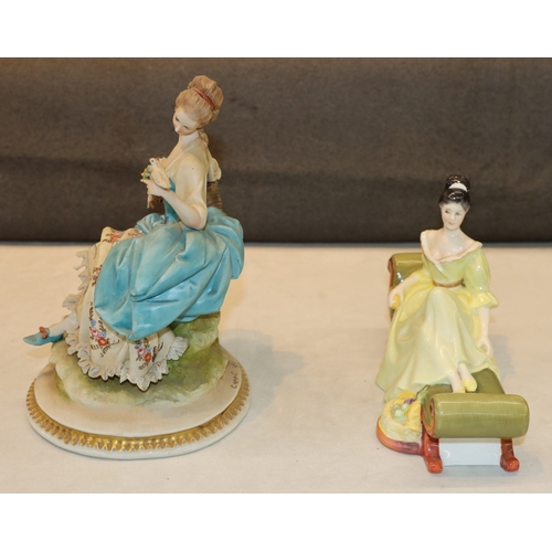 3048 - A Royal Doulton figurine of a reclining lady 