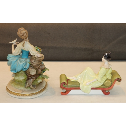 3048 - A Royal Doulton figurine of a reclining lady 