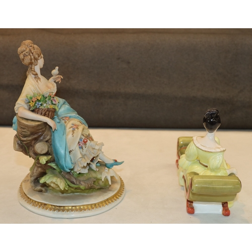 3048 - A Royal Doulton figurine of a reclining lady 