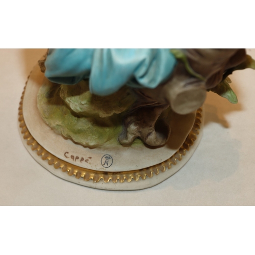 3048 - A Royal Doulton figurine of a reclining lady 