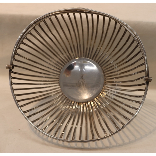 3057 - A Sheffield plated bread basket, 27cm diameter,  12.5cm high excluding handle.
