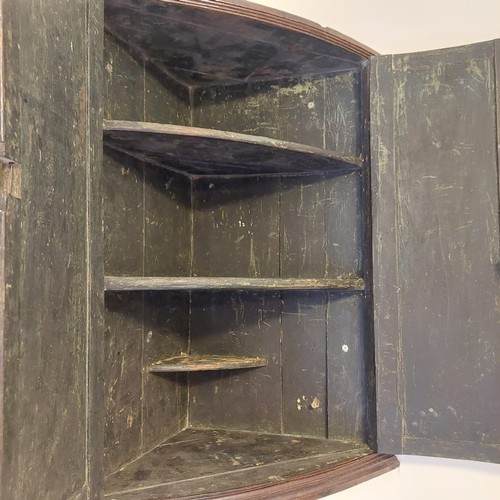 3009 - THIS LOT IS NOT HELD BY PFW. A 19th century small bow fronted corner cupboard, 70cm wide, 37cm deep,... 