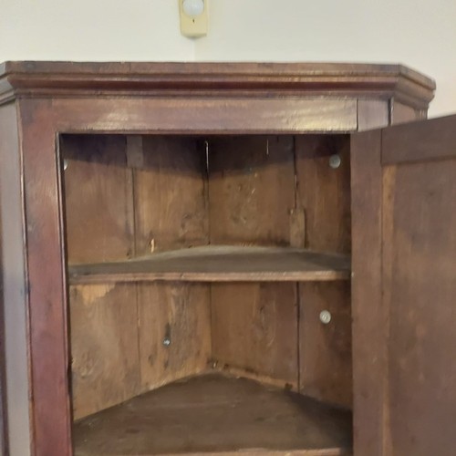 3010 - THIS LOT IS NOT HELD BY PFW. A 19th century oak straight fronted hanging corner cupboard, 76cm wide,... 