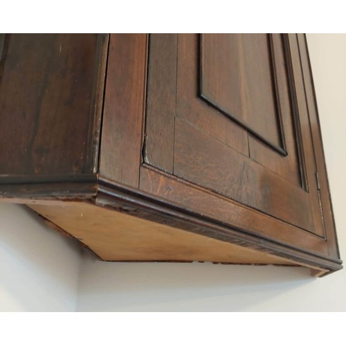 3010 - THIS LOT IS NOT HELD BY PFW. A 19th century oak straight fronted hanging corner cupboard, 76cm wide,... 
