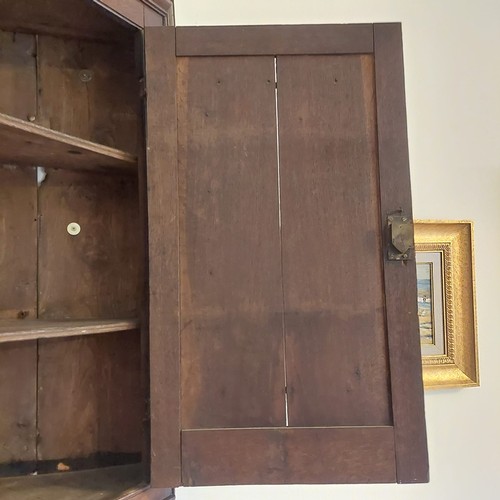 3010 - THIS LOT IS NOT HELD BY PFW. A 19th century oak straight fronted hanging corner cupboard, 76cm wide,... 