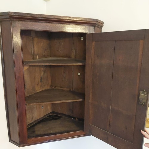 3010 - THIS LOT IS NOT HELD BY PFW. A 19th century oak straight fronted hanging corner cupboard, 76cm wide,... 