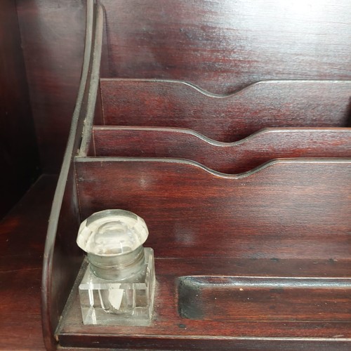 3011 - THIS LOT IS NOT HELD BY PFW. A mahogany bureau, 3 drawers, interior writing slope with leather inser... 
