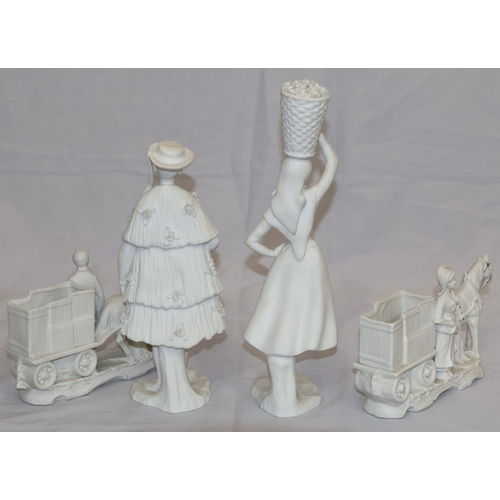 59 - A pair of white Bisque figures of a gentleman and lady carrying basket on her head, 25cm high and a ... 