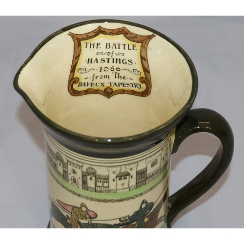 19 - A Royal Doulton Series Ware round bulbous shaped jug 
