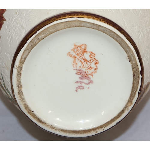 143 - A Bonn glazed china round bulbous thin necked jug with serpent handle, on white and green ground wit... 