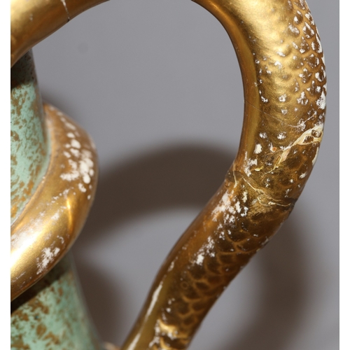 143 - A Bonn glazed china round bulbous thin necked jug with serpent handle, on white and green ground wit... 