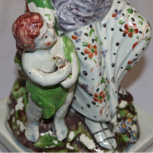 152 - A Ralph Wood style Staffordshire group 