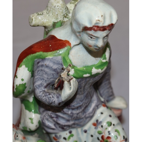 152 - A Ralph Wood style Staffordshire group 