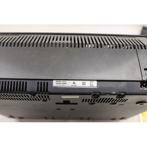 3108 - A Silver-Reed EX43 Electronic Compact Typewriter with protective cover and operating manual.