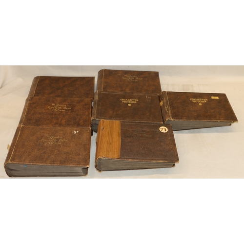 3297 - 7 empty cigarette card albums (some wear).