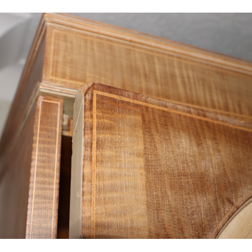 3195 - THIS ITEM IS NOT HELD BY PFW. An early 20th century Maple & Co triple wardrobe with central drawers ... 