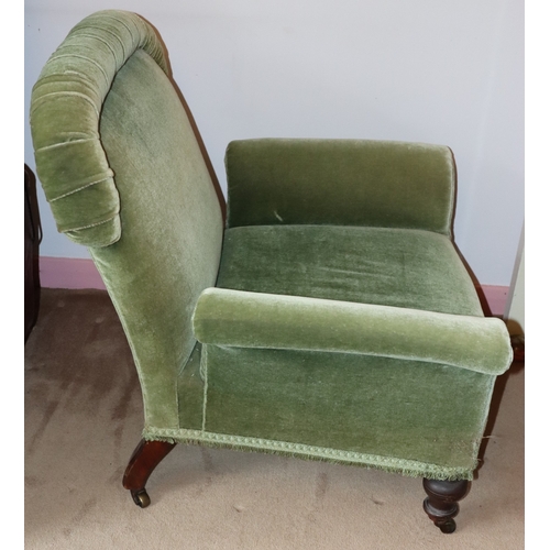 3203 - THIS ITEM IS NOT HELD BY PFW. A green upholstered low chair on castors, 85cm wide, 80cm deep, 84cm h... 