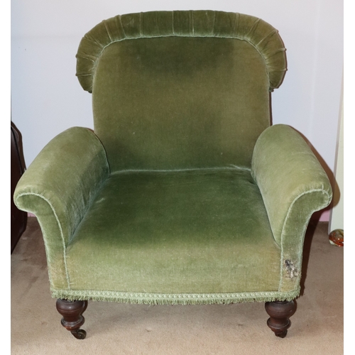 3203 - THIS ITEM IS NOT HELD BY PFW. A green upholstered low chair on castors, 85cm wide, 80cm deep, 84cm h... 