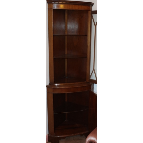3204 - THIS ITEM IS NOT HELD BY PFW. A mahogany corner cabinet with upper glazed door enclosing interior sh... 