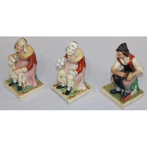 90 - A pair of 19th Century Staffordshire figures of Cobbler and his wife, on square bases, 16.5cm high a... 