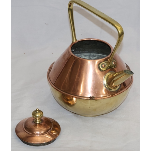 897 - Benham & Froud, Arts & Crafts copper and brass round bulbous shaped kettle with fixed overhead handl... 