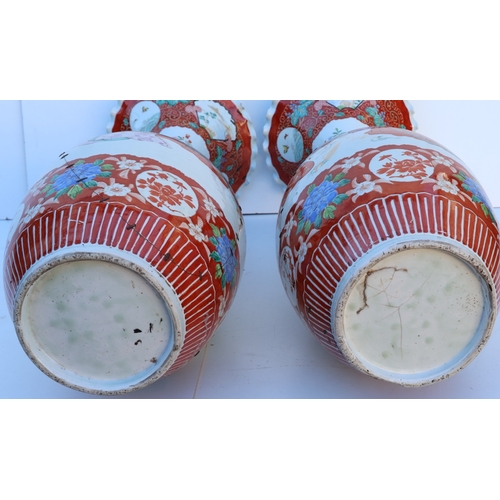 103 - A pair of large round bulbous thin necked trumpet shaped floor vases with crinkled rims, on white gr... 
