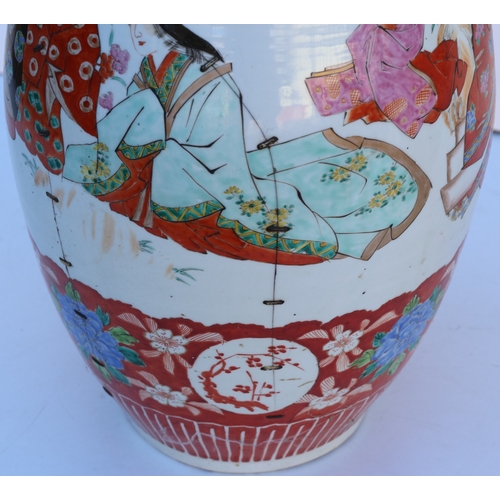 103 - A pair of large round bulbous thin necked trumpet shaped floor vases with crinkled rims, on white gr... 