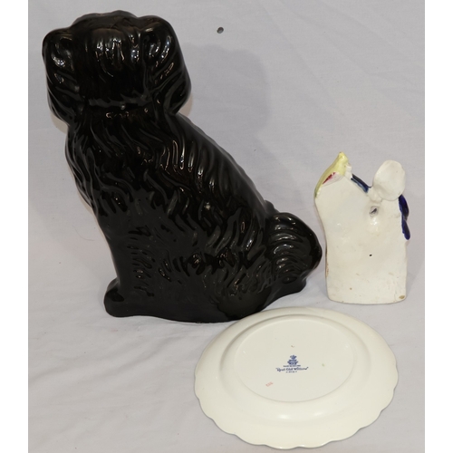 104 - A Victorian black Staffordshire large china figure of a seated Spaniel with gilt decoration, 35cm hi... 