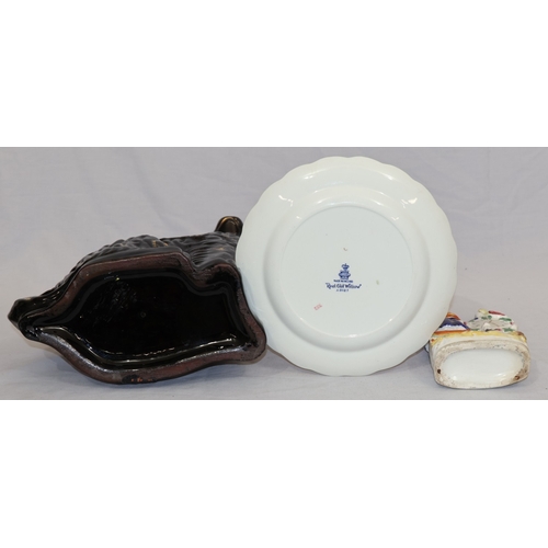 104 - A Victorian black Staffordshire large china figure of a seated Spaniel with gilt decoration, 35cm hi... 