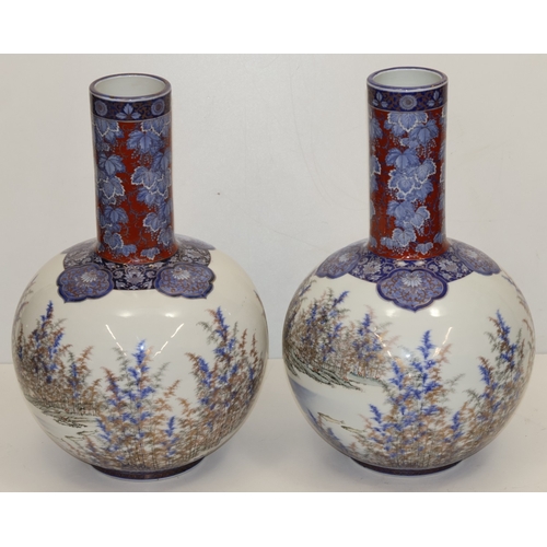 106 - A pair of large Japanese round bulbous thin necked vases with multi-coloured fish, landscape, floral... 