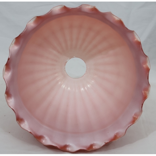 107 - A Moore Brothers white china round bulbous shaped oil lamp with allover raised cupid, floral, leaf a... 