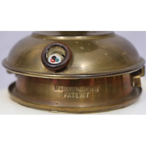 107 - A Moore Brothers white china round bulbous shaped oil lamp with allover raised cupid, floral, leaf a... 