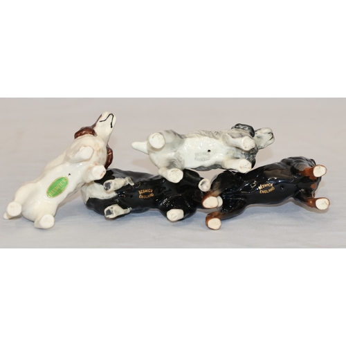109 - 4 various Beswick figures of dogs, largest 8.2cm high (4)