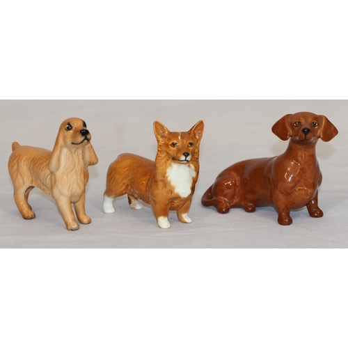 110 - 3 various Beswick figures of dogs, largest 7.5cm high (3)