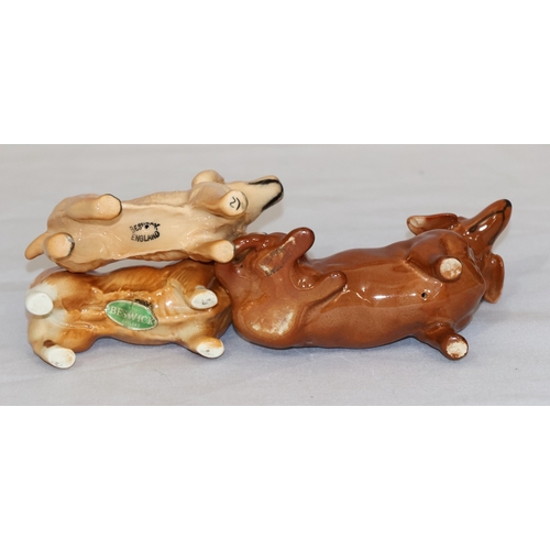 110 - 3 various Beswick figures of dogs, largest 7.5cm high (3)