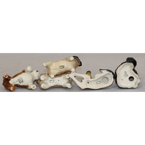 111 - 4 various Beswick figures of dogs and 1 Beswick figure of a cat (5)