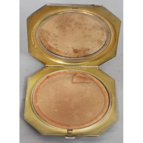 394 - A Birmingham silver and green enamelled square compact with chamfer corners, hinged lid enclosing mi... 